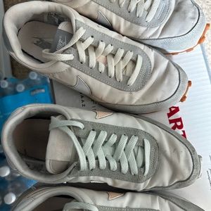 Women’s Nike sneakers- both included in price